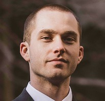 Analista di trading e specialista del mercato crypto, Thomas Whitfield, ritratto.